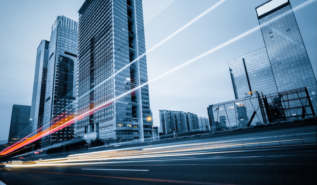 the light trails on the modern building background in shanghai china.