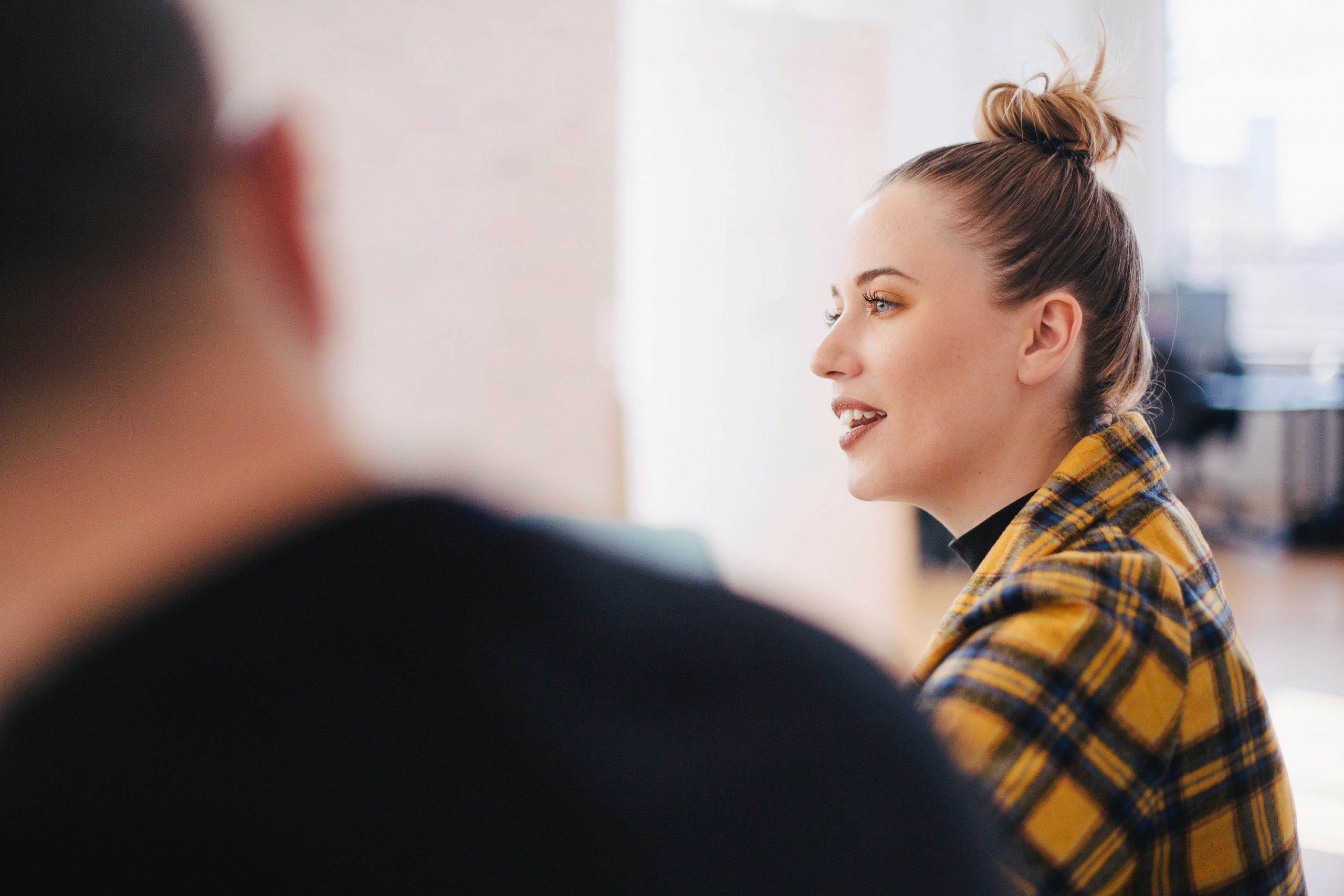 woman speaking in a work meeting